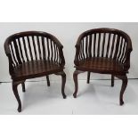 Matching pair of hardwood bow backed conservatory chairs with slatted seats (2)