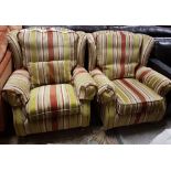 Matching Pair of modern Armchairs with wing backs, green, red and beige striped upholstery, one