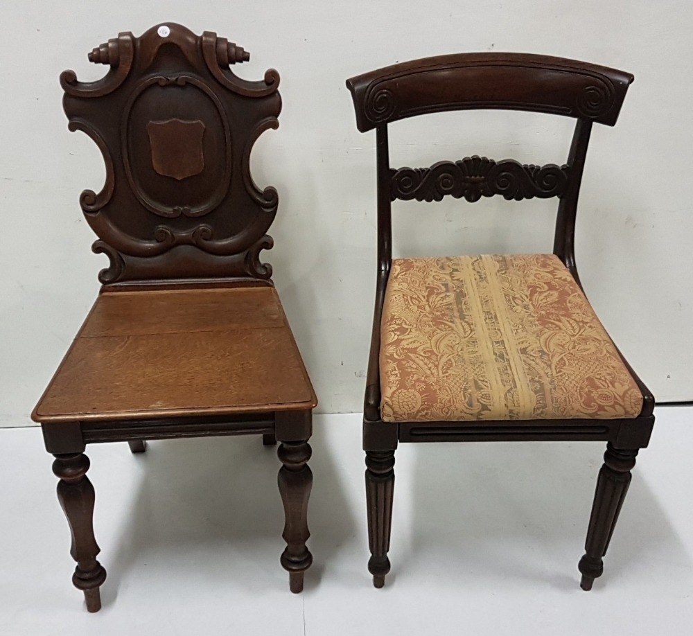 19th C oak hall chair with armorial shaped back and a William IV mahogany dining chair (2)