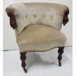 19th C gent’s armchair, with a bowback and serpentine front, on turned front legs, casters