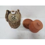 Stoneware Jar in a wicker basket & a terracotta dish with a lid (2)