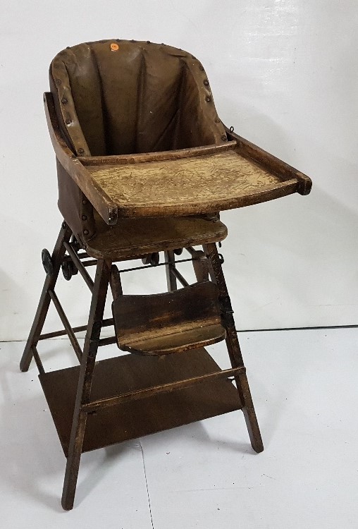 Child’s 1930’s Highchair, with brown leather seat and back, lift-up tray