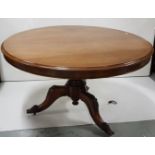 William IV mahogany circular table, 47"d, on a pod base with 3 carved legs