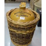 Large stoneware Whiskey Jar, stamped “Boyd, Ryan, Clonmel”, in original wicker case