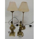 Two pairs of brass table lamps (electric) - 1 corinthian column style and 1 with cream shades