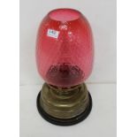 Edw. Brass Container Oil Lamp, with a large red glass shade, 19”h