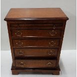 Compact Walnut Chest of Drawers, with writing slide above 5 drawers and brass drop handles 62cm w