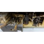 Floor board pusher and small box of wire brushes and grinding stone & an old bench vice
