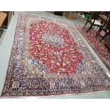 Iranian Blue and Red Ground Persian Wool Floor Rug, floral design, multiple borders, 3.78m x 2.50m