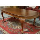 Nicely polished oval end mahogany extending dining table, rope edged, with one removable leaf, 79"