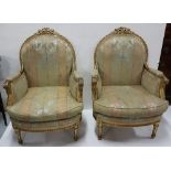 Matching Pair of large Carved Wood and Gilt Framed Armchairs, with decorative finials, on turned