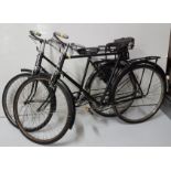 2 x Raleigh bicycles with brakes, one Gent’s with saddle rack and one Lady’s with child’s seat (2)