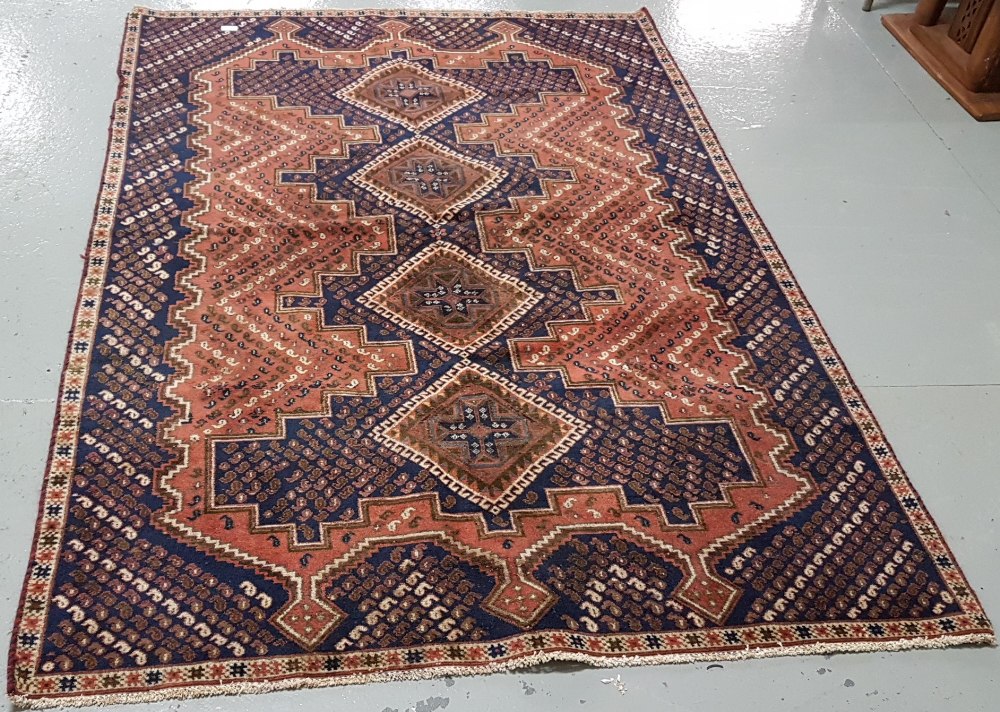 Old blue and red ground Persian Nejafabad Floor Rug, with a cross medallion design, 1.95 m x 1.35m - Image 2 of 2