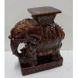 Brown majolica style plant stand in the form of an Elephant, 23”h, base 10”w