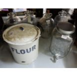 4 glass wine distilling bottles, modern glass soda dispenser & an enamel “Flour” tin (5)
