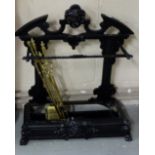 Cast Iron stick Stand, painted black with gargoyle mask with removable tray, lion feet, 29"w x 34"h