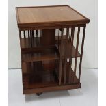 Large Edwardian Mahogany Revolving Dumbwaiter, the reeded top over 8 book compartments, on