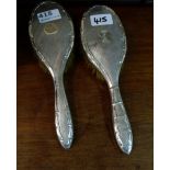 Two similar silver backed grooming brushes (Birmingham)