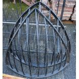 Pair of bow-shaped Hay Racks, painted black, each 36”w