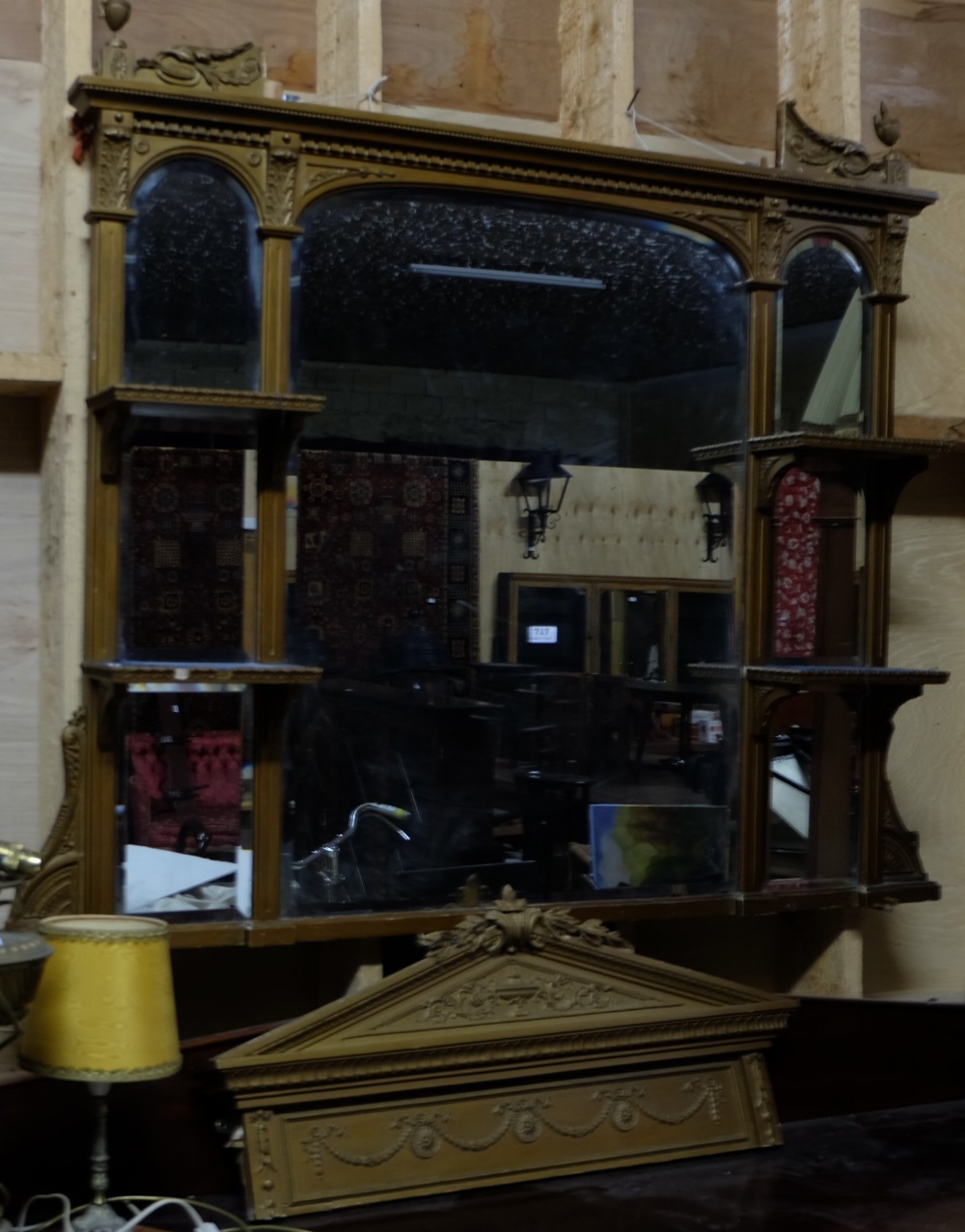 Victorian carved Giltwood Overmantle (repaired finial), 6 bevelled mirrors around a central large