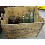 Wooden Crate “Powers”, with various coloured glass bottles