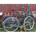 Old Army Bicycle, painted green, with a leather seat, another bicycle with damaged wheel & a