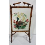 Bamboo Framed Fire-screen, inset with a glass panel, painted with image of a duck