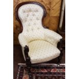 Victorian mahogany framed armchair with a lovely dart boarded top, turned front legs, cup casters,