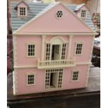 Large timber doll’s house, painted pink/cream/grey with various dolls and furniture, 25”w x 28”h x