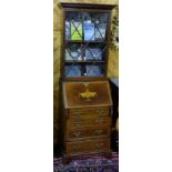 Late 19th C mahogany compact Bureau Bookcase, a single glazed door over a bureau with urn inlaid