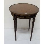 Circular Occasional Table, in the French Style, with a brass gallery, on narrow turned and reeded