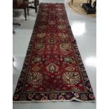 Long Persian Tabriz Floor Runner, red ground, with a unique all-over design and a deep blue