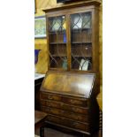 Reproduction Mahogany Bureau Bookcase, two glazed doors over a slopefront desk, above 3 drawers,