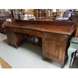 19thC Nelson Mahogany Sideboard, a raised gallery over a serpentine front with 3 drawers and two