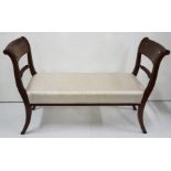 Mahogany framed window seat, Regency bar back ends, sabre legs with silver satin covered padded