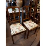 Pair of Edwardian inlaid mahogany chairs.