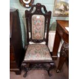 Nice pair of carved mahogany hall chairs with upholstered seats.