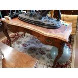 19th. C. kingwood desk with inset leather top and ormolu mounts.