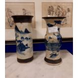 Two blue and white ceramic Oriental brush pots.