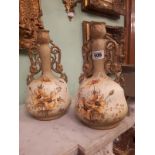 Decorative pair of Austrian ceramic vases overlaid with gold.