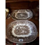 Two brown and white joint dishes.