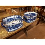 Pair of blue and white footbaths.