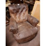 19th. C. deep buttoned leather Gentleman's easy chair.