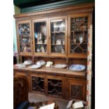Victorian oak bookcase the two centre glazed doors flanked by two astragal glazed doors above four