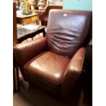1960's ox blood red leather upholstered armchair.