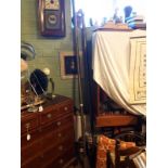 Two 19th. C. brass curtain poles.