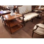 Pair of mahogany three tier side tables.