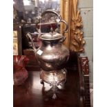 19th. C. silver plated spirit kettle on stand.