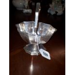 English silver sugar basket with bright cut decoration the ten sided bowl raised on a column and