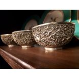 Three 19th. C. engraved white metal Oriental drinking bowls, with seal on base.